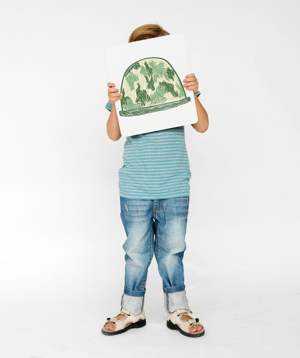 Child with a drawing of soldier helmet