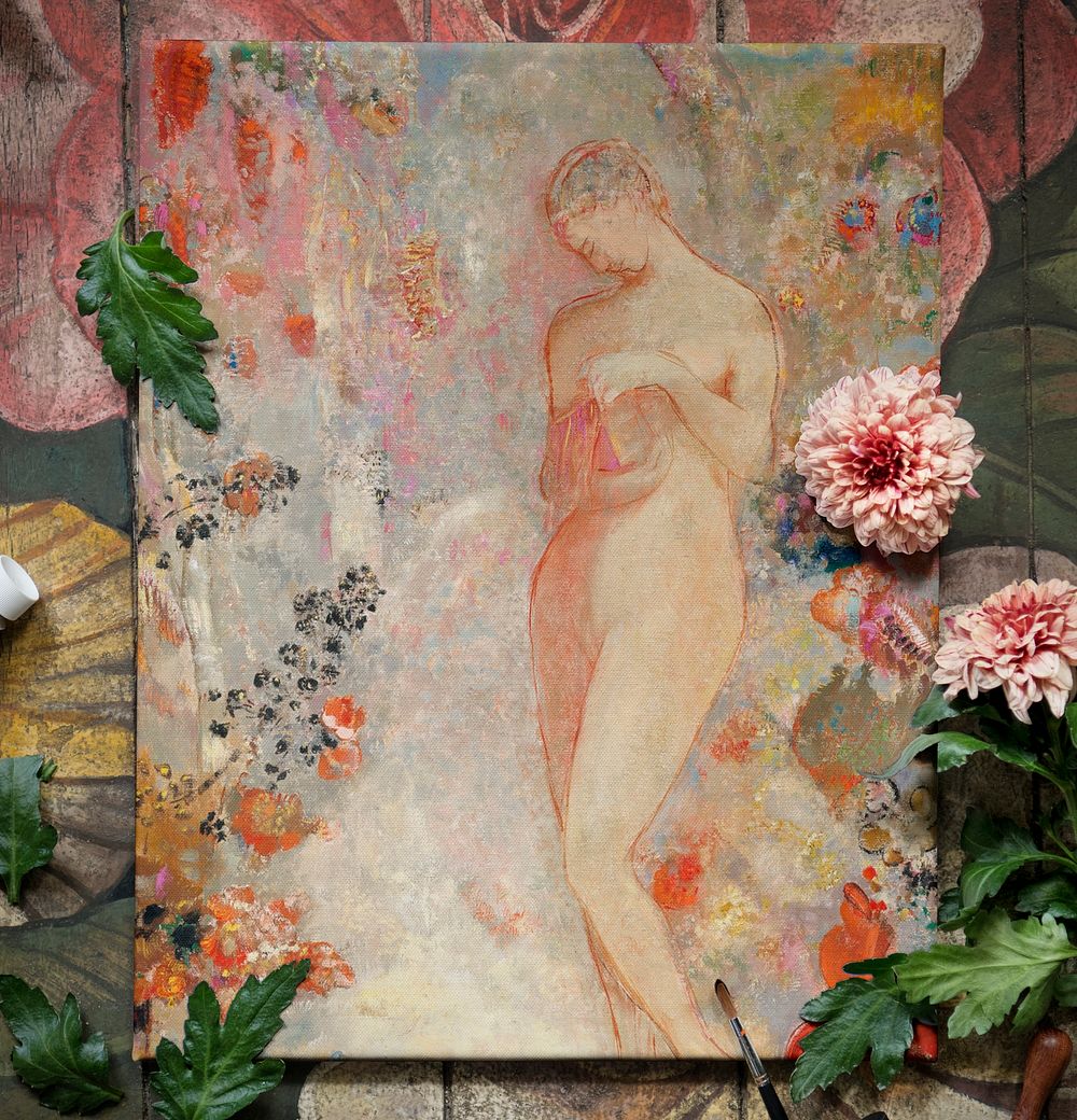 Naked woman painting on canvas 