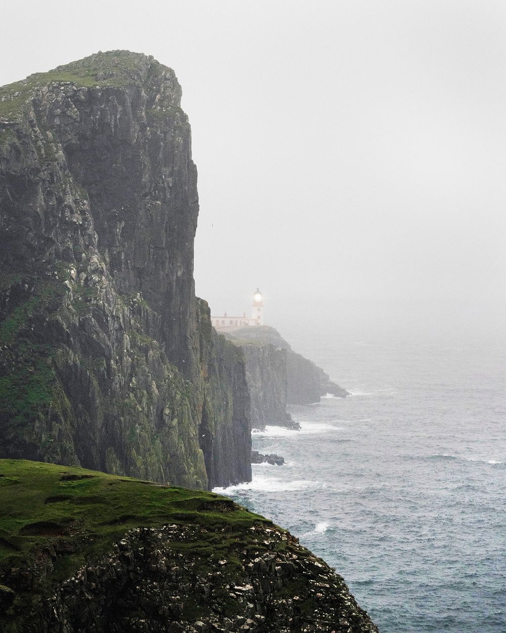 Misty Neist Point Lighthouse at Isle of Skye, Scotland