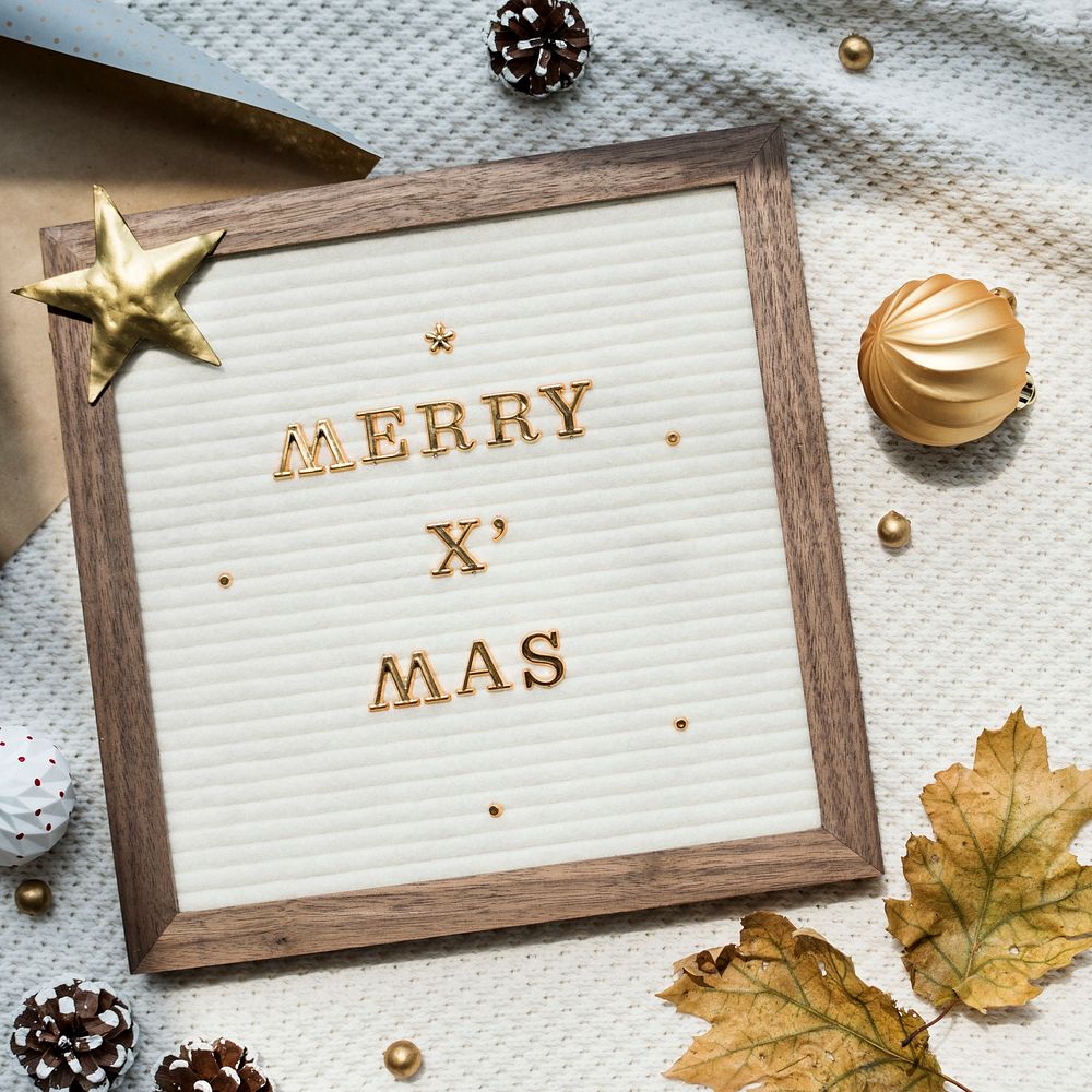Merry Xmas on a wooden frame