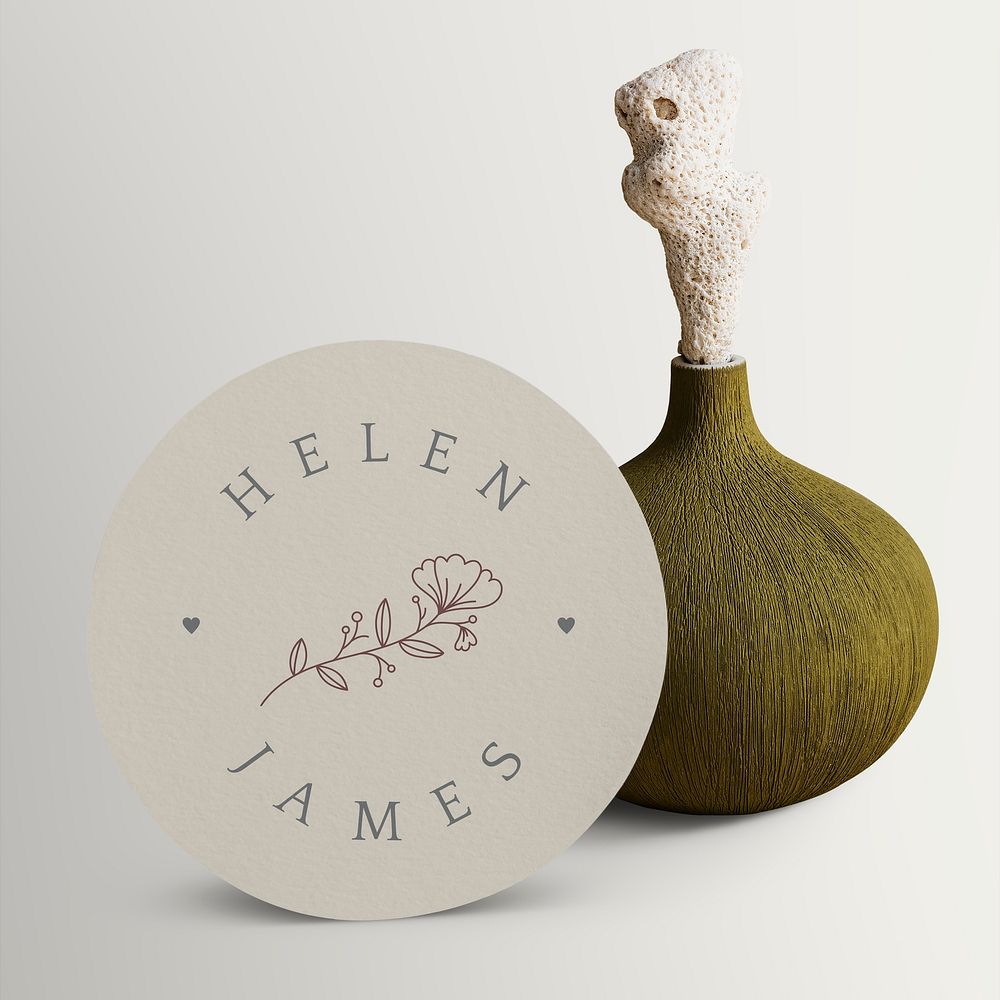 Round space label mockup with craft green vase