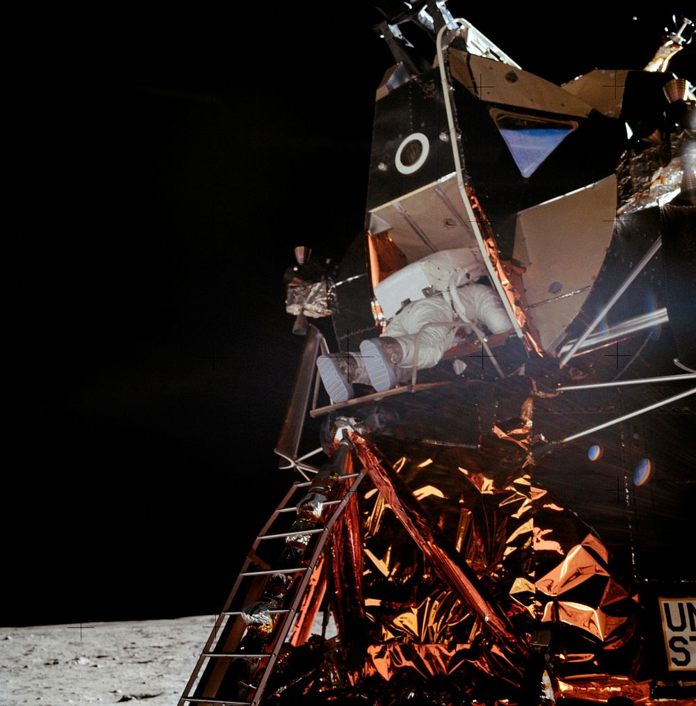 Astronaut Edwin E. Aldrin Jr., lunar module pilot, is photographed egressing the Lunar Module (LM) during the Apollo 11…