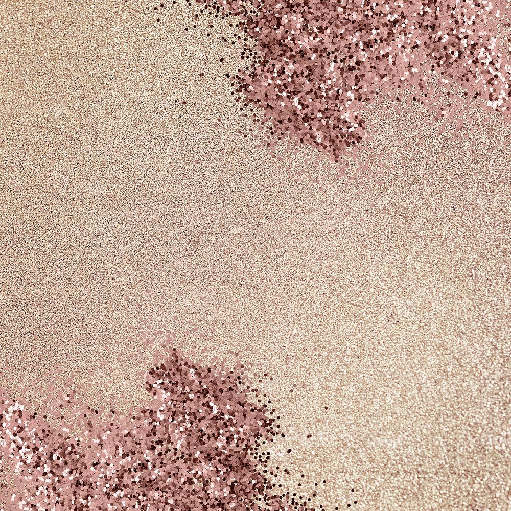 Pink glitter confetti on a beige background 