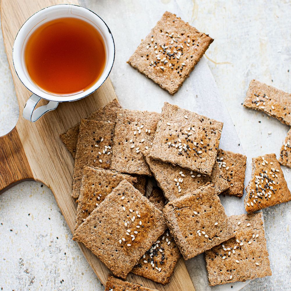Healthy organic seeded rye crackers with salsa sauce