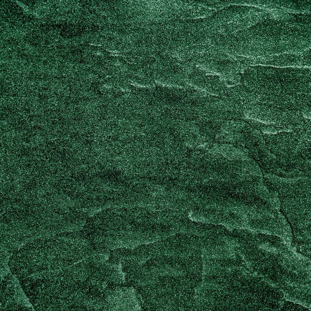 Rough green paint textured wallpaper background