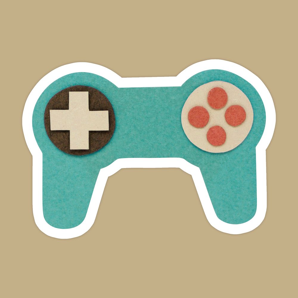 Green game controller paper craft sticker on beige background