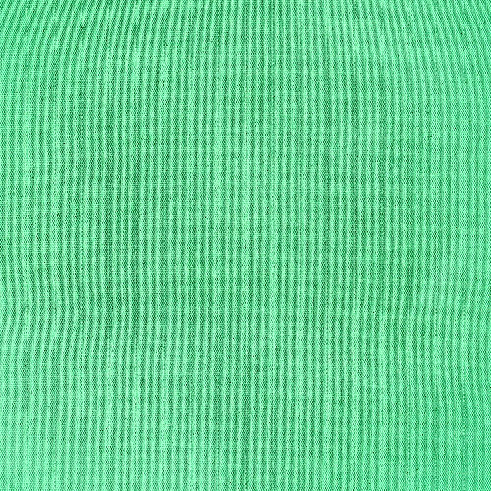 Bright green fabric textured background
