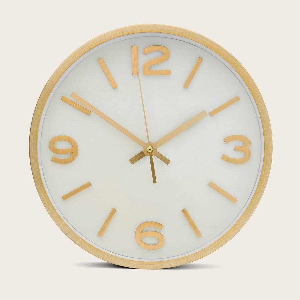 Round gold analog clock mockup on a beige background