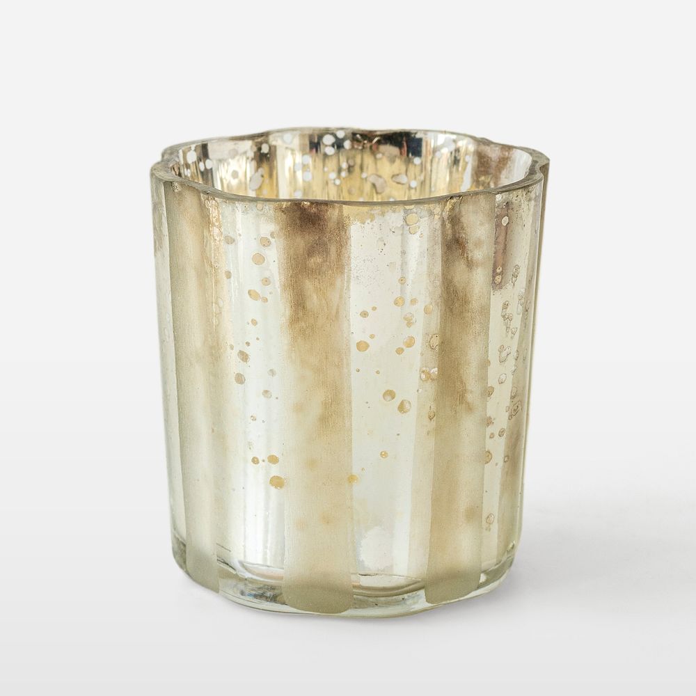 Glass candle holder on off white background