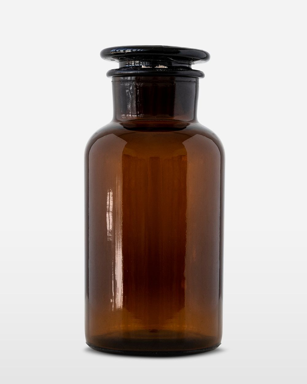 Empty medical brown glass bottle with a glass lid
