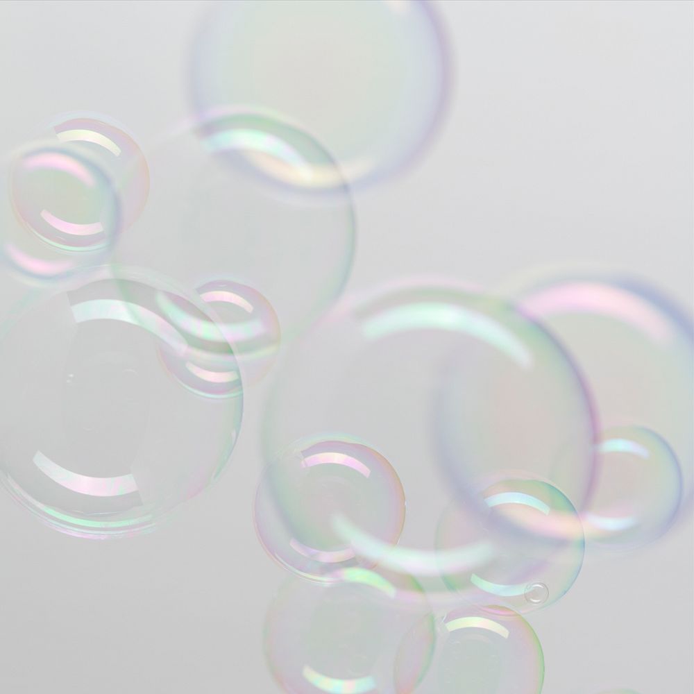 Transparent soap bubble pattern on a gray background