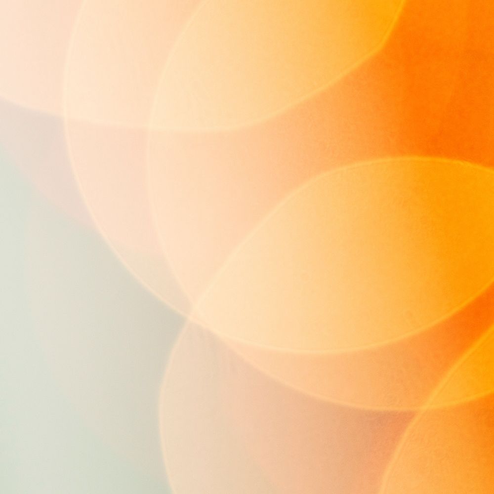 Orange bokeh patterned background