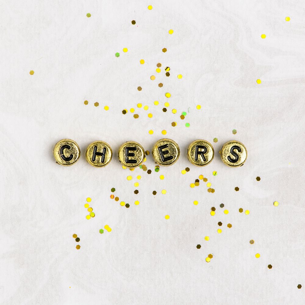 CHEERS beads word typography on white