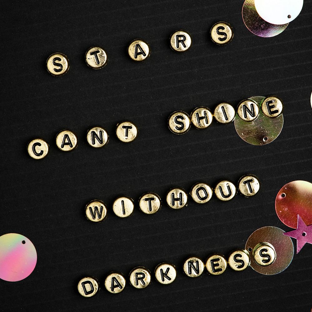 STAR CANT SHINE WITHOUT DARKNESS gold beads text typography on black