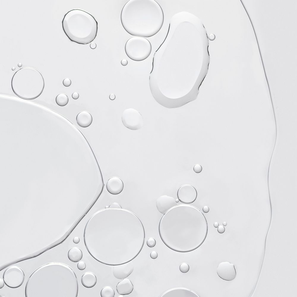Gray background, oil bubble in water