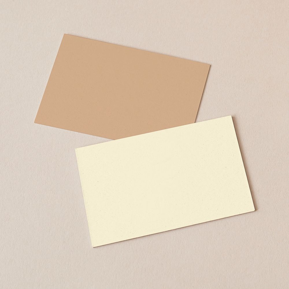 Business cards on beige background