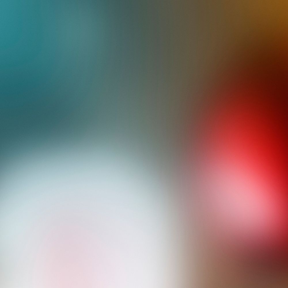 Blurry red and white Christmas baubles background