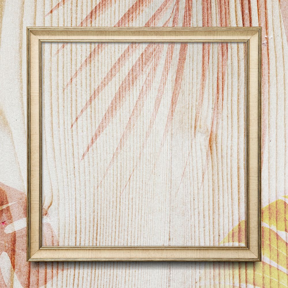 Square frame with leaves decoration on wooden texture background