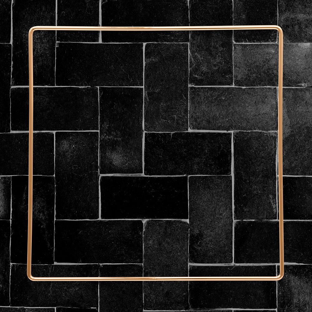 Square gold frame on a black brick background