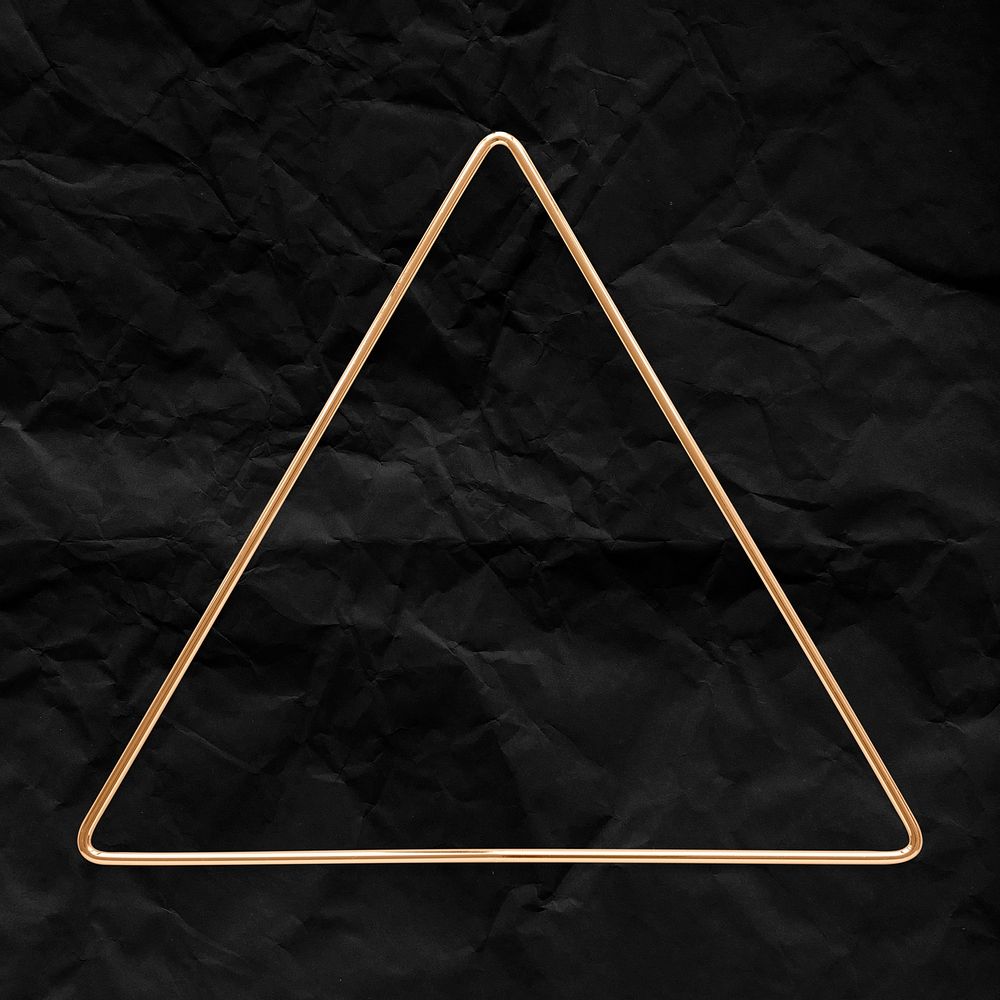 Triangle gold frame on a crumpled black paper textured background