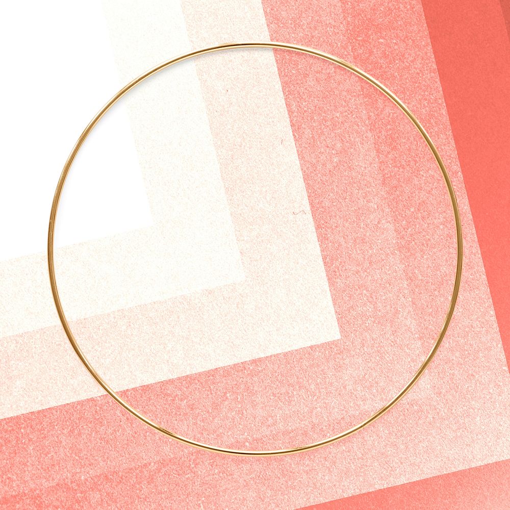 Round gold frame on an ombre red layer patterned background