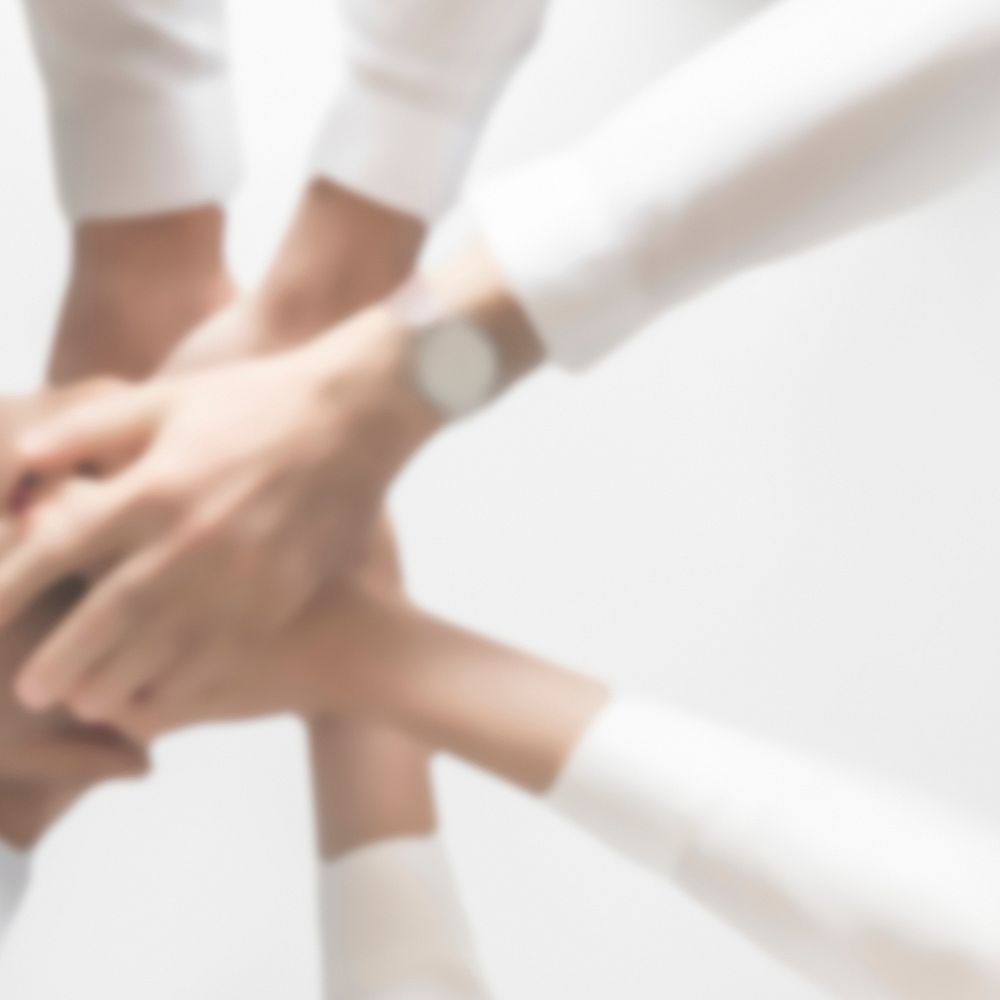 Successful business teamwork joining hands
