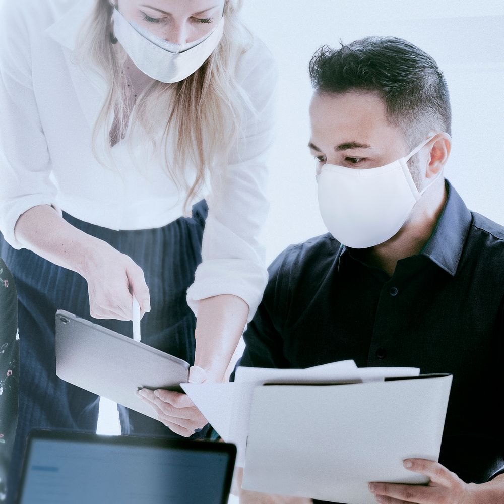 Business team wearing face masks during coronavirus pandemic
