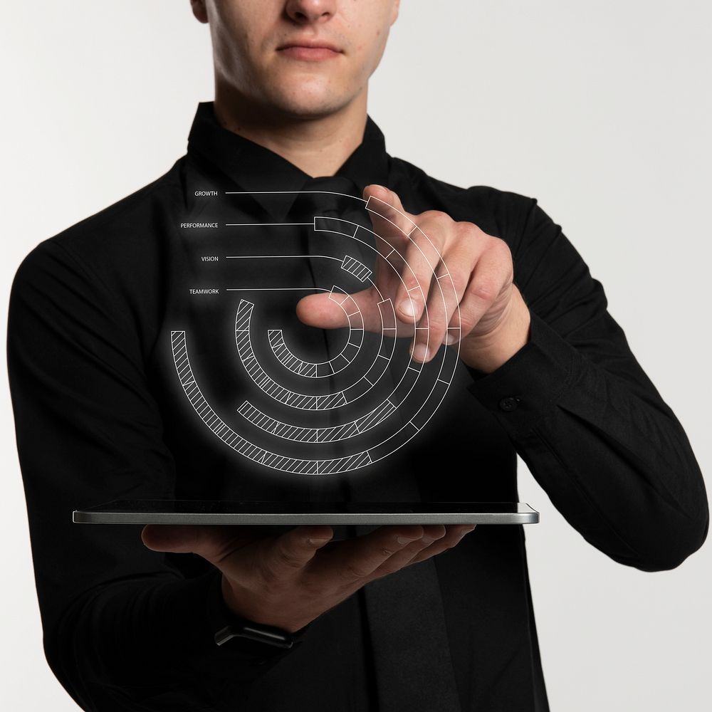 Futuristic digital presentation by a businessman in formal shirt