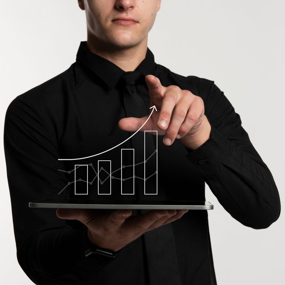Futuristic digital presentation by a businessman in black shirt 