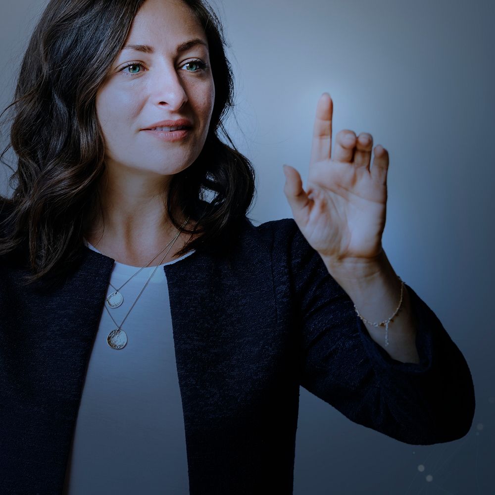 Senior businesswoman pointing on invisible screen