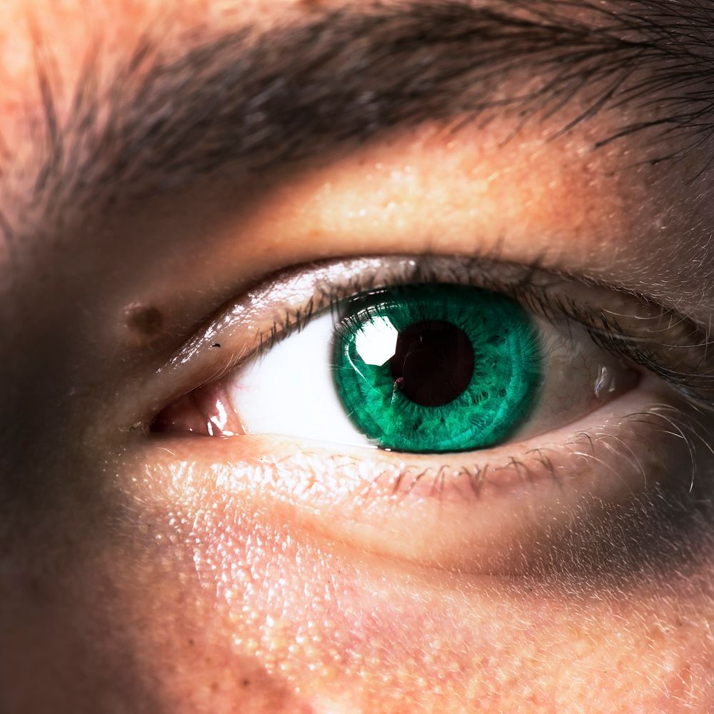 Man with a beautiful green eye color 