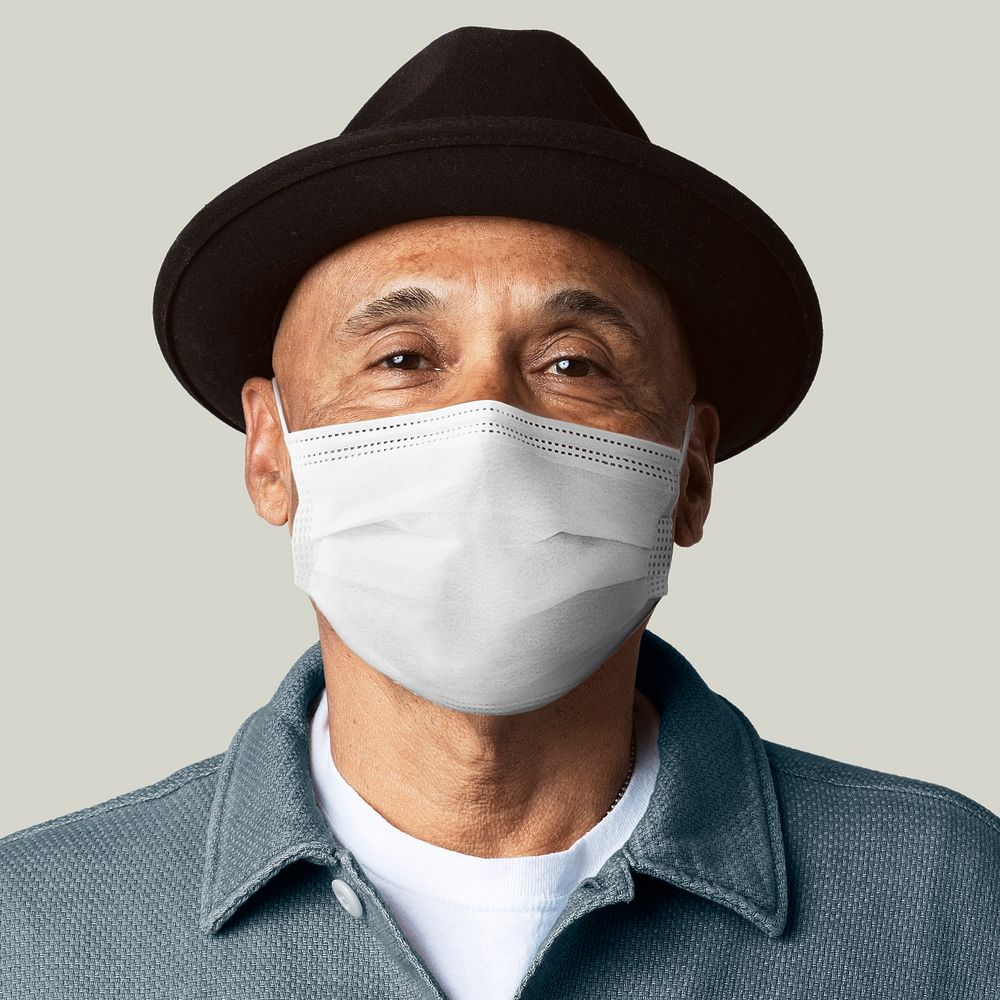 Mature man wearing mask  for Covid-19 campaign studio shoot