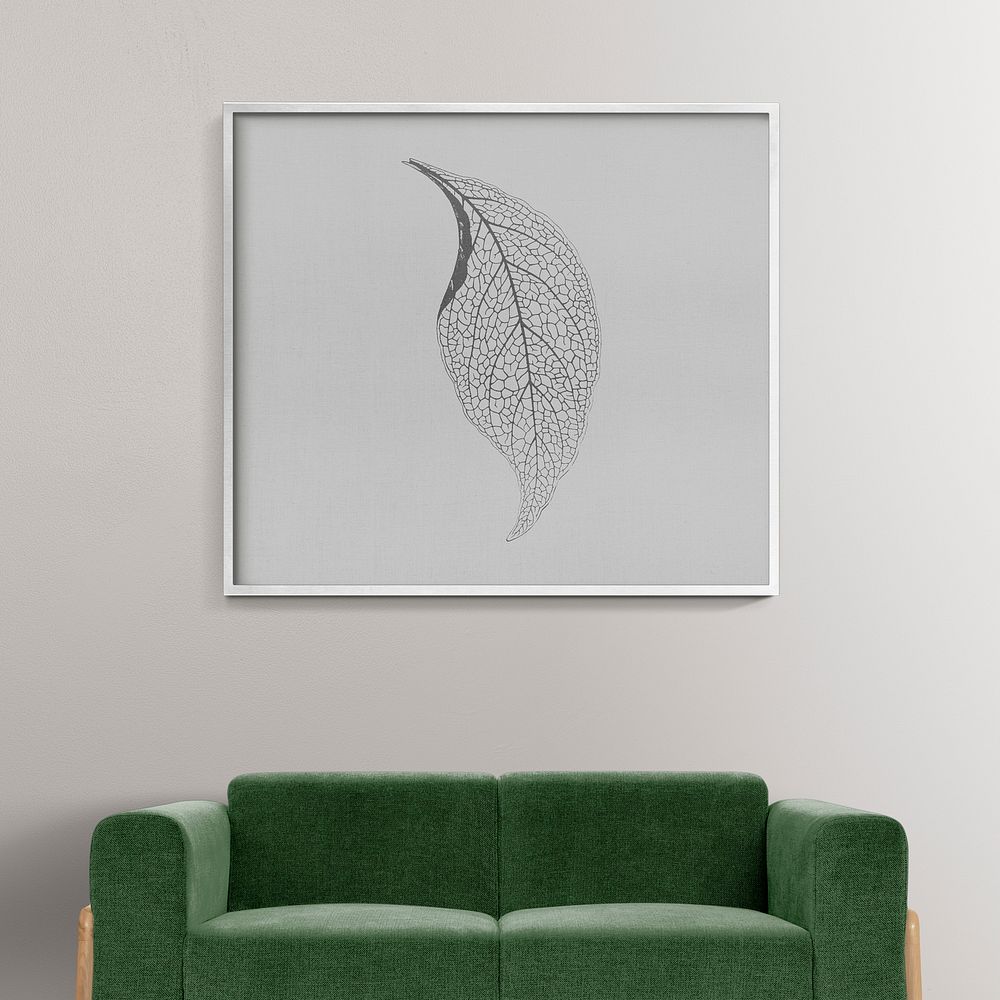 Modern living room interior design with leaf photo frame hanging on a wall