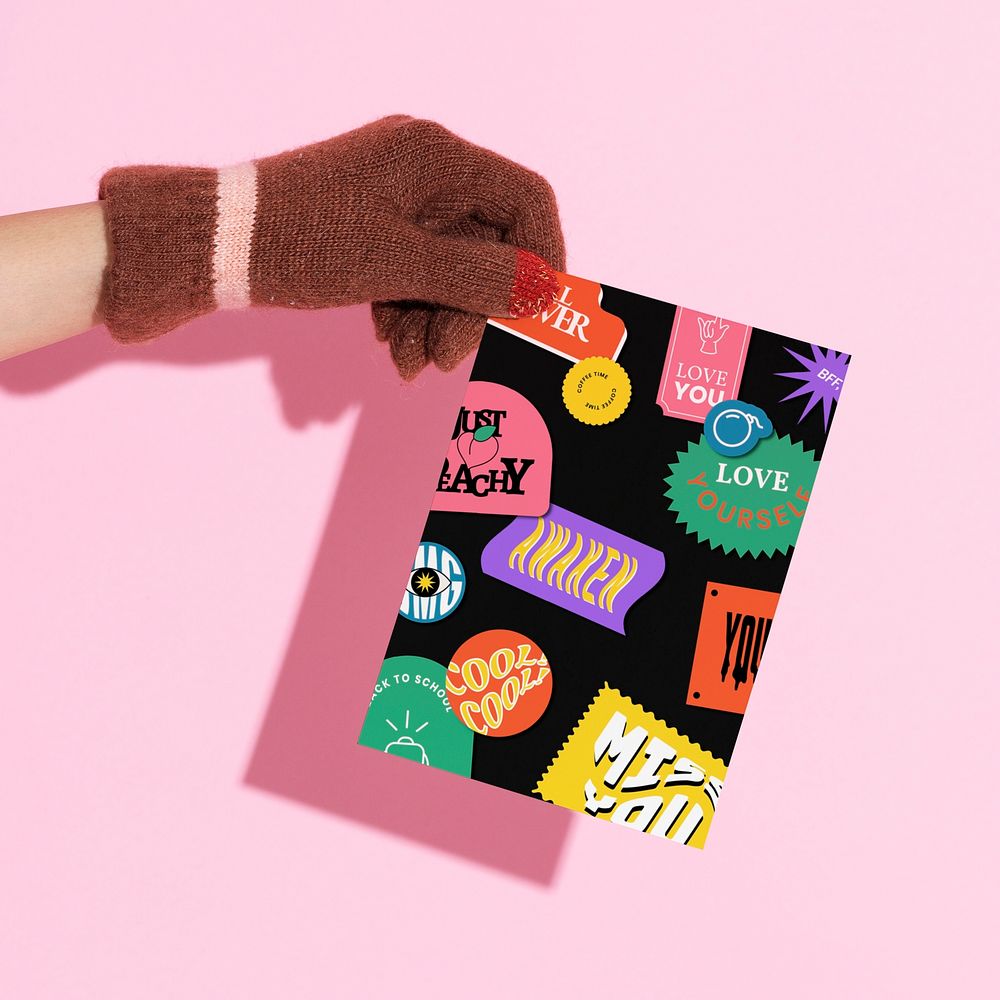 Hand holding paper poster, funky invitation card photo