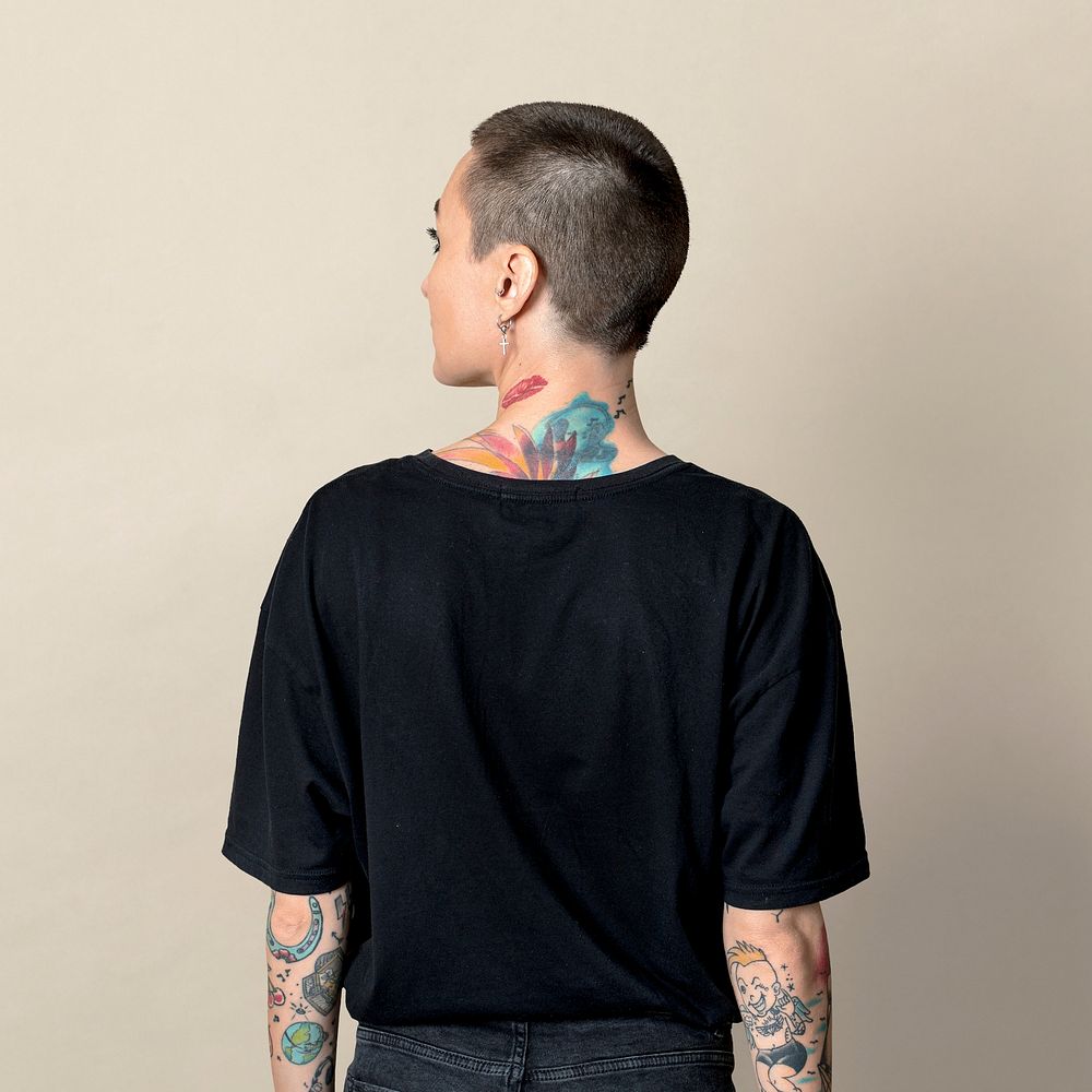 Tattooed woman in a black t-shirt