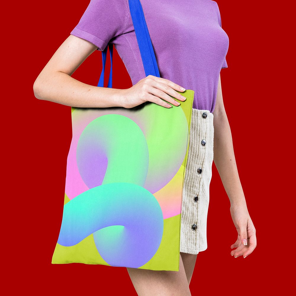 Woman carrying colorful tote bag photo