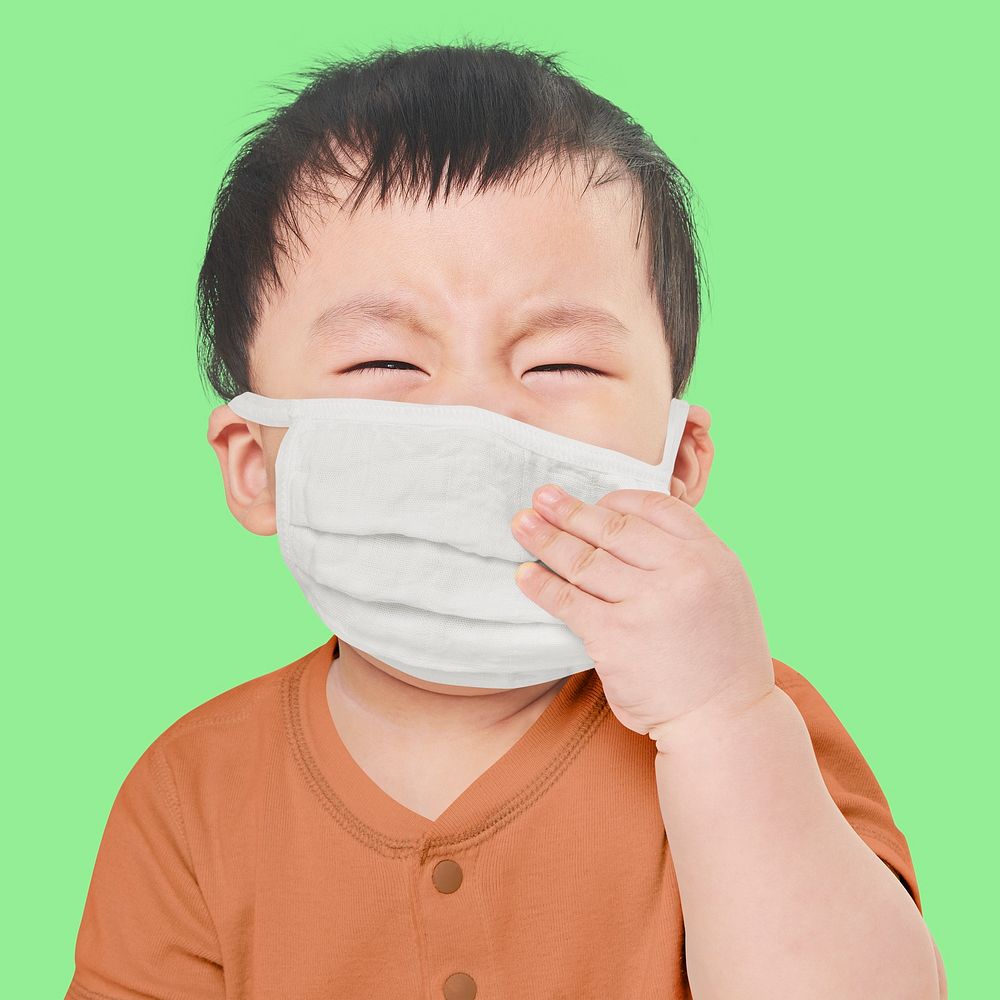 Psd child wearing face mask in studio mockup
