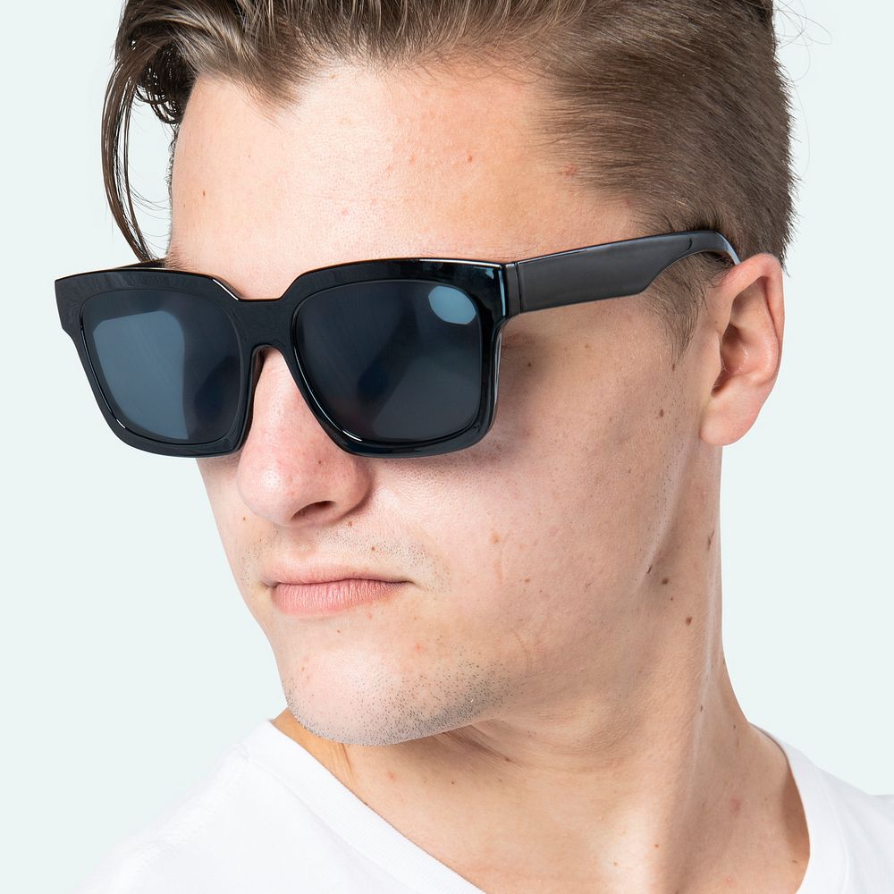Handsome man wearing black wayfarer sunglasses close up