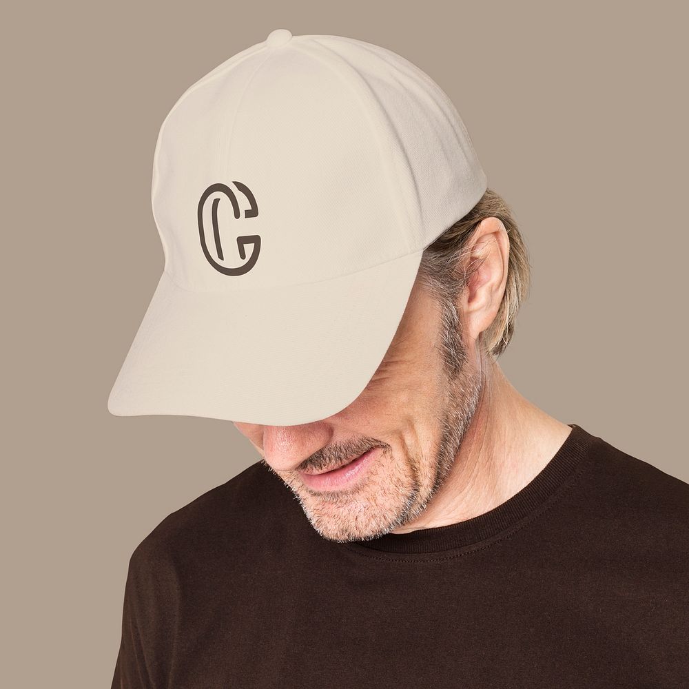 Man in beige cap with C logo for senior apparel shoot