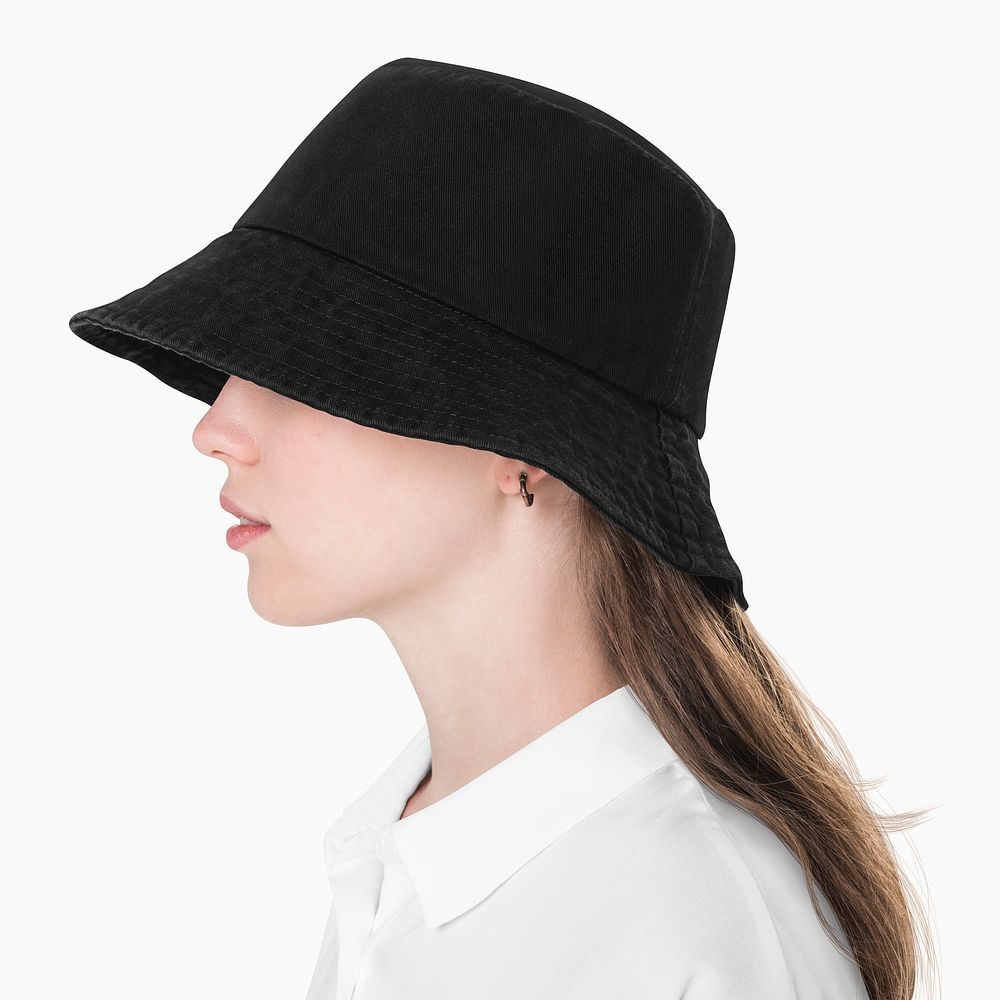 Teenage girl in black bucket hat for street fashion shoot
