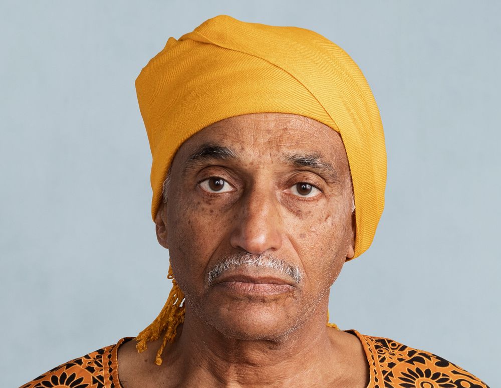 Mixed senior Indian man wearing a yellow turban mockup 