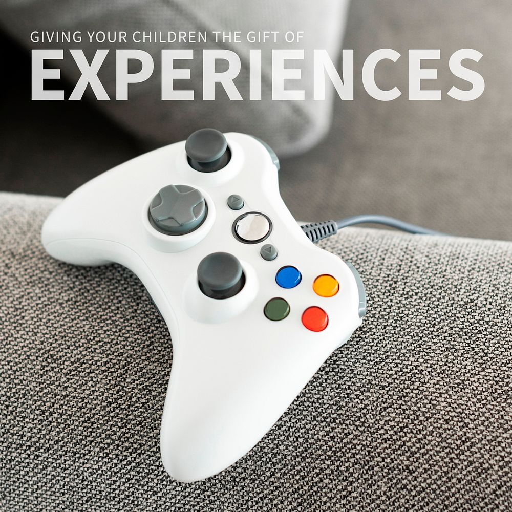 Game console on the couch with giving your children the gift of experiences text