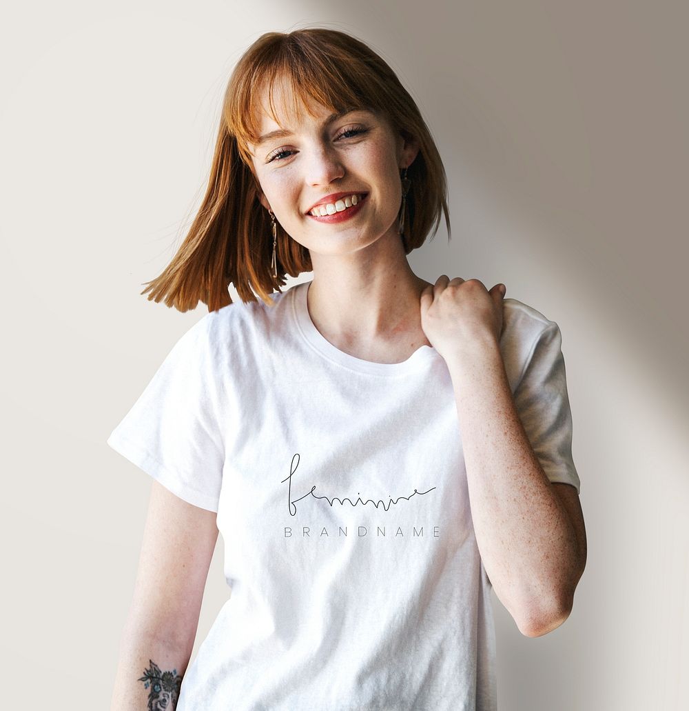 Smiling woman wearing a silk screen white t-shirt
