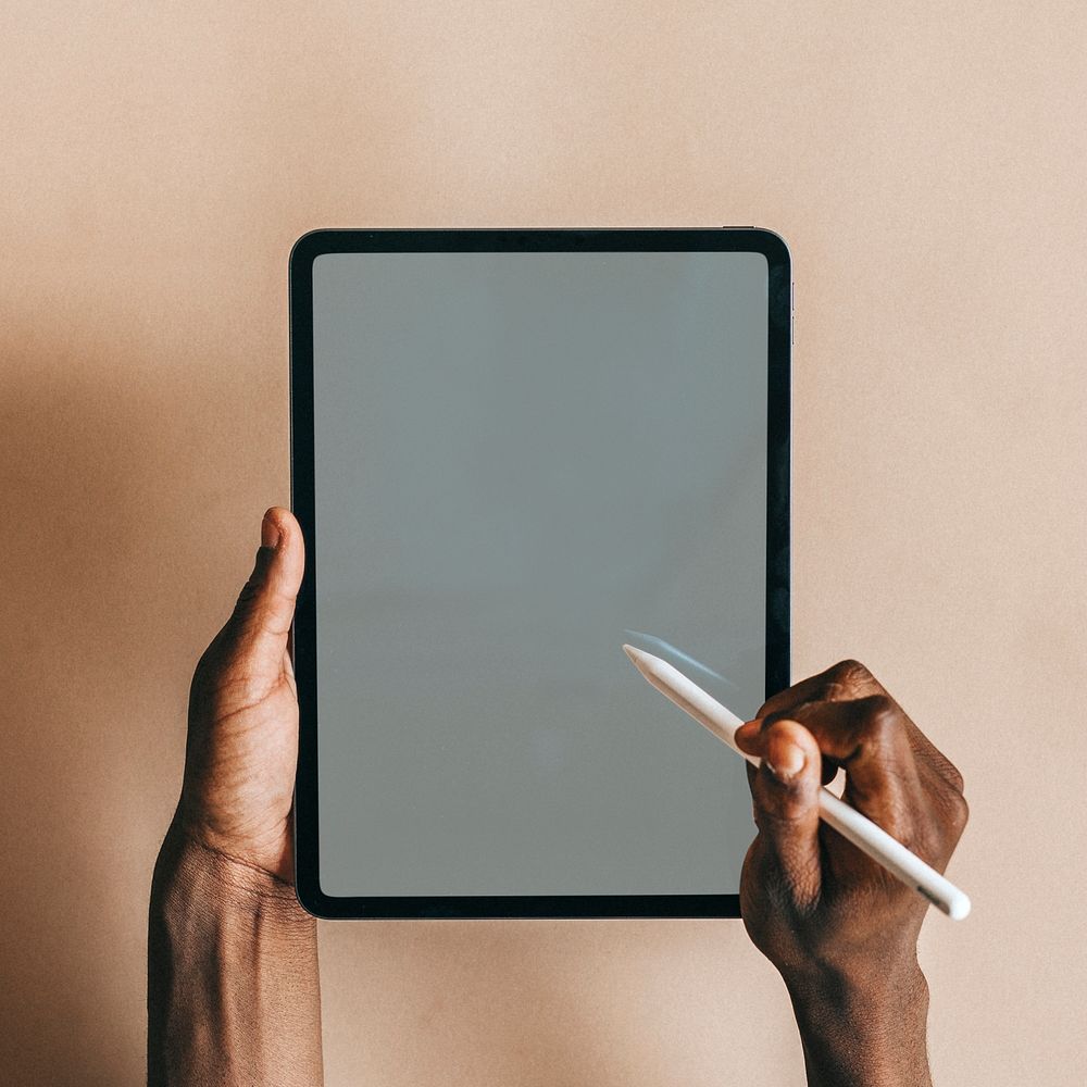 Black man using a digital tablet