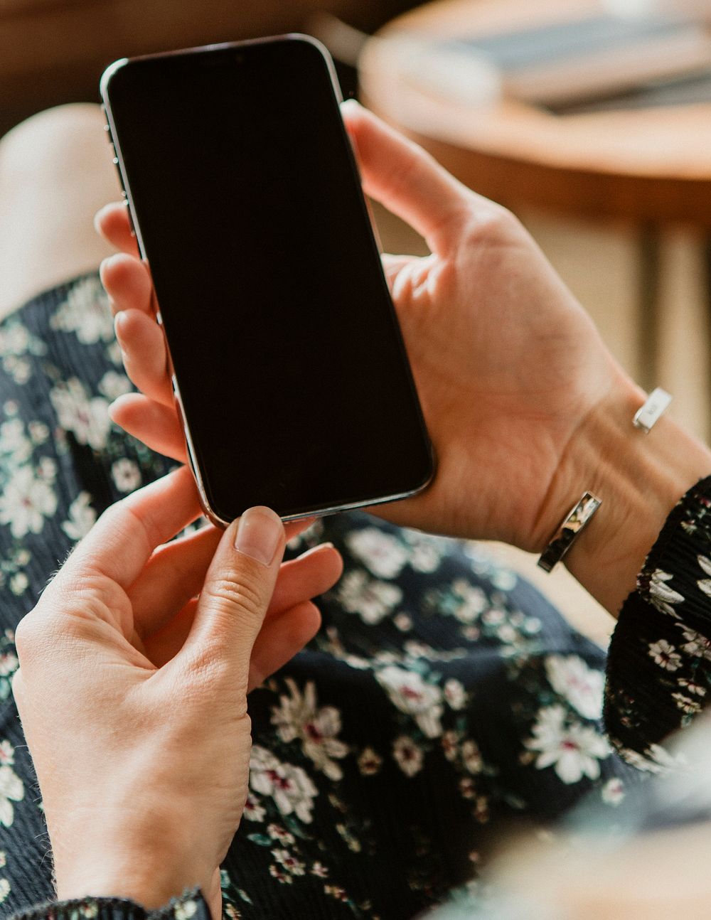 Woman using a mobile phone at home