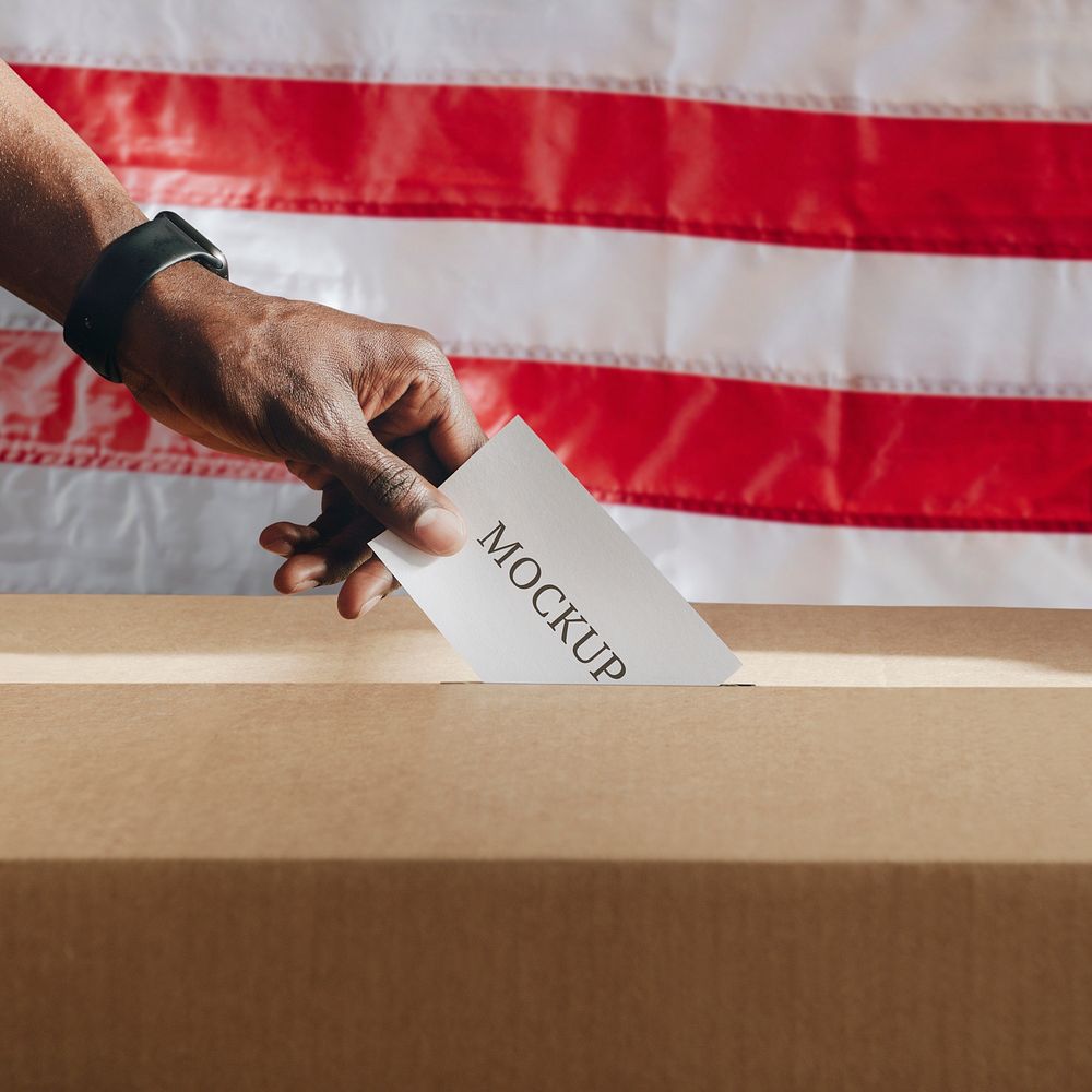 American casting his vote to a ballot box mockup