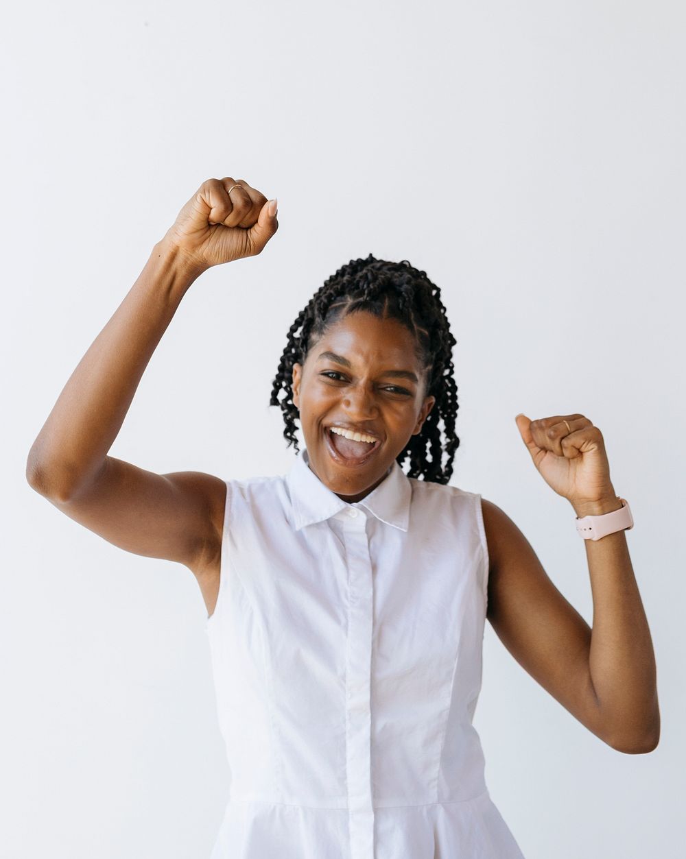 Happy black woman portrait shoot in a studio