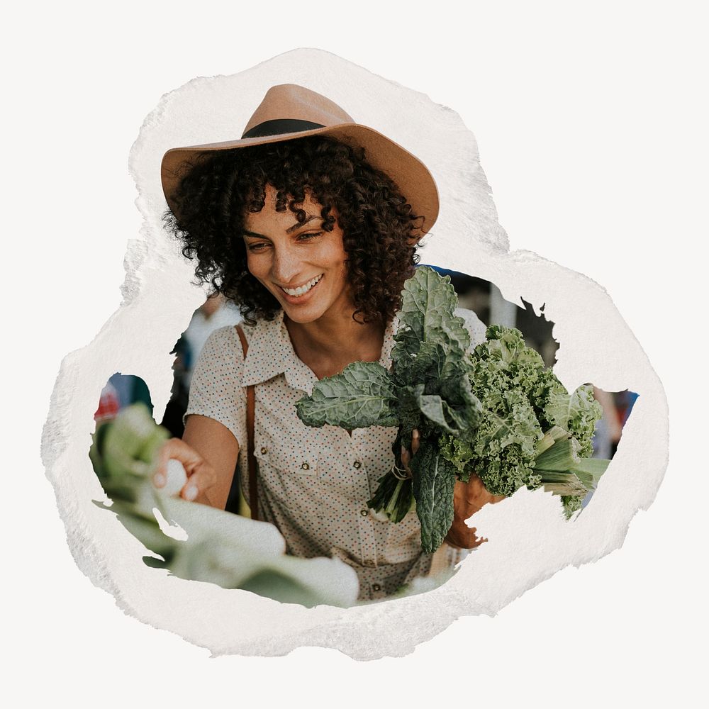 Beautiful woman buying kale at a farmers market image element