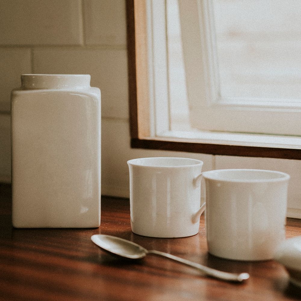 Coffee white porcelain jars on kitchen counter