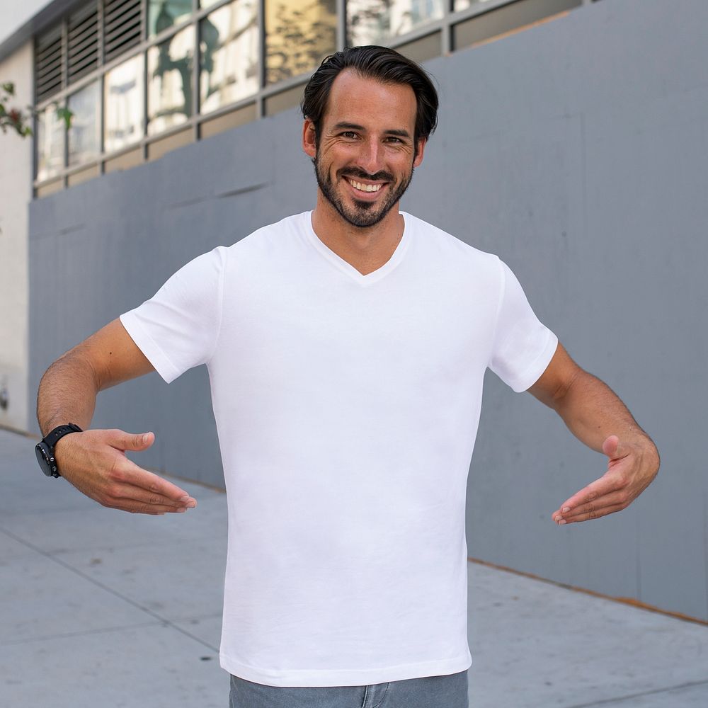 Man wearing casual white t-shirt in the city apparel shoot